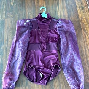 Maroon costume with added bling